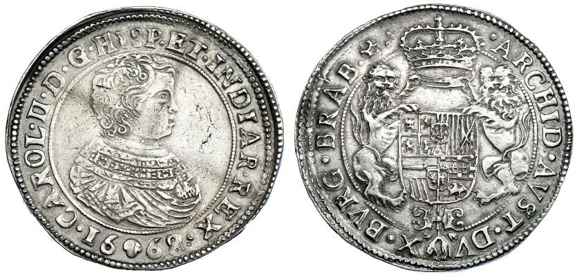 931   -  COLECCIÓN DE DUCATONES Y PATAGONES DE DOBLE PESO. CARLOS II. Doble ducatón. 1668. Bruselas. A/ CAROL. II. D. G. HISP. ET. INDIAR. REX. R/ . ARCHID. AVST. DV-X. BVRG. BRAB . Zc. AR 64,95 g. DEL-326a (R2). DAV-4474. MBC/MBC+. Muy rara.