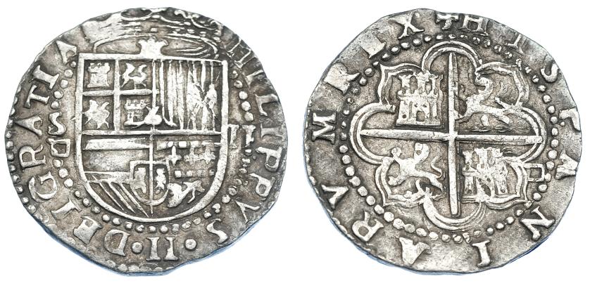952   -  FELIPE II. 2 reales. S/F. Sevilla. Marca de ensayador de Melchor Damián en anv. y rev. Muy redonda. AC-403. MBC.