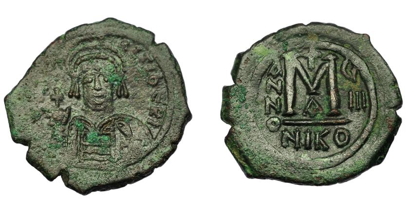 387   -  IMPERIO BIZANTINO. MAURICIO TIBERIO. Follis. Nicomedia. AE 10,89 g. 31,6 mm. SBB-512  vte. Leves oxidaciones. MBC/MBC+.