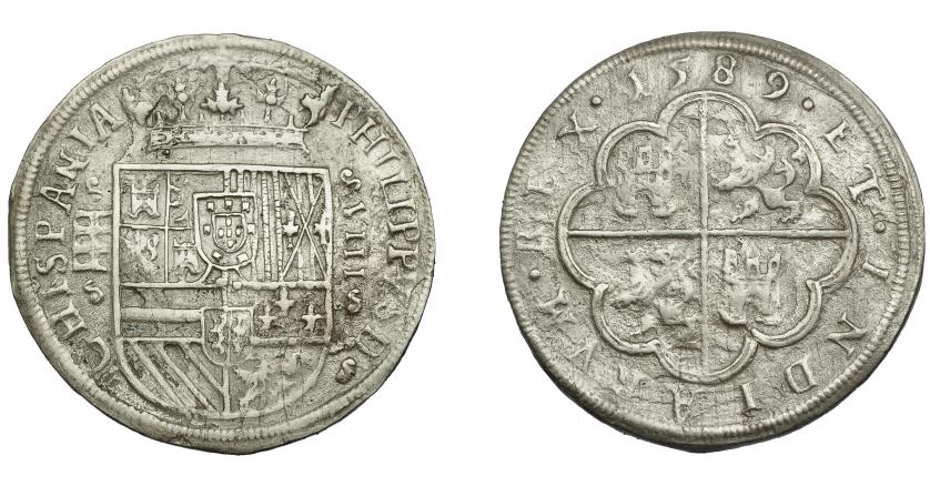 529   -  FELIPE II. 8 reales. 1589. Segovia. Doble acueducto de tres arcos. Ley. HISPANIA en anv. y INDIARRUM en rev. AR 24,23 g. AC-710. Erosiones marinas. MBC/BC+. Muy escasa.