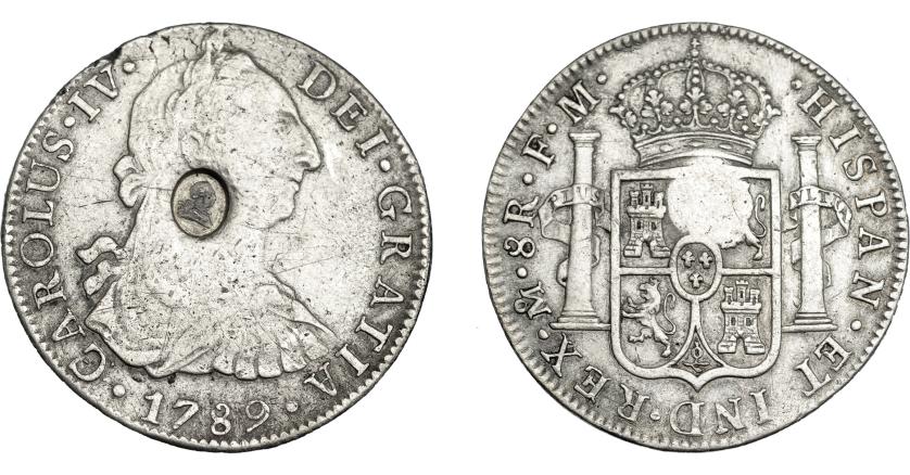 1016   -  COLECCIÓN DE RESELLOS. GRAN BRETAÑA. Dólar. Resello busto de Jorge III dentro de óvalo sobre 8 reales 1789 México FM. KM-625. MBC.