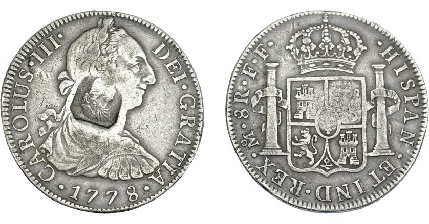 1024   -  COLECCIÓN DE RESELLOS. GRAN BRETAÑA. Dólar. Resello busto de Jorge III dentro de punzón octogonal sobre 8 reales 1778 México FF. KM-655. MBC.