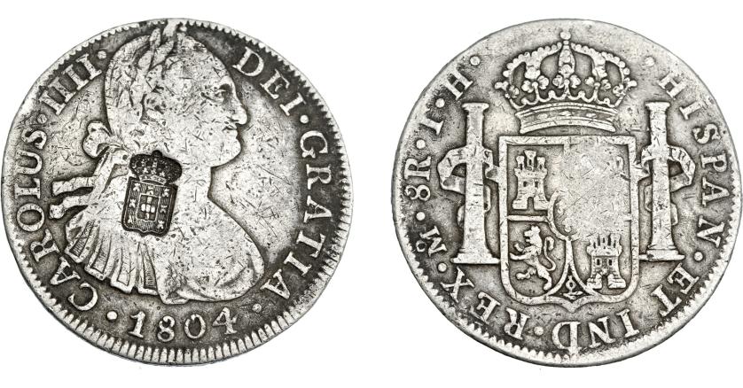 1056   -  COLECCIÓN DE RESELLOS. PORTUGAL. 870 reis. Resello escudo de Portugal sobre 8 reales 1804 México TH. KM-440.13. Gomes-27.37. La moneda BC+, el resello MBC.