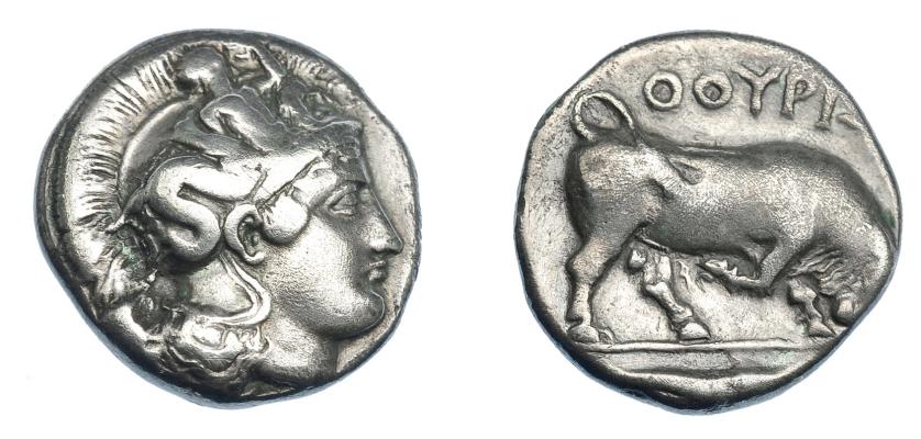 334   -  GRECIA ANTIGUA. LUCANIA. Thurium. Didracma (400-350 a.C.). A/ Cabeza de Atenea a der. con casco ático decorado con Scylla. R/ Toro embistiendo a der., en exergo pez; ϴOYPIΩN. AR 7,57 g. 19,9 mm. COP-1436. SBG-447. MBC. Escasa. Ex col. Guadán 1449.