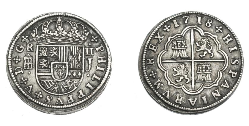 664   -  FELIPE V. 2 reales. 1718. Segovia. J. Acueducto grande. Con adornos en ley. y puntos en anv. VI-762 vte. AC-947. MBC+.