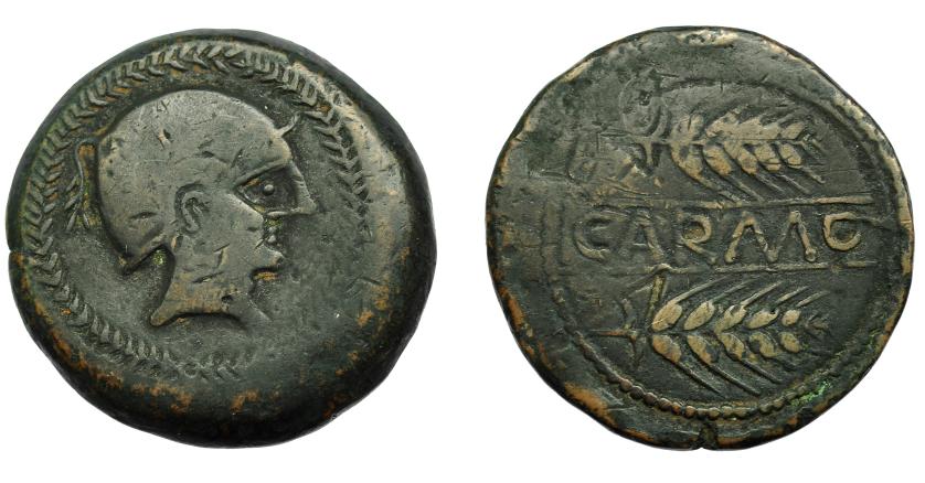 18   -  HISPANIA ANTIGUA. CARMO. As. A/ Cabeza con casco a der., alrededor láurea. R/ Dos espigas, en medio entre líneas CARMO. AE 20,64 g. 32,7 mm. I-454. ACIP-2382. Pátina oscura. BC+.