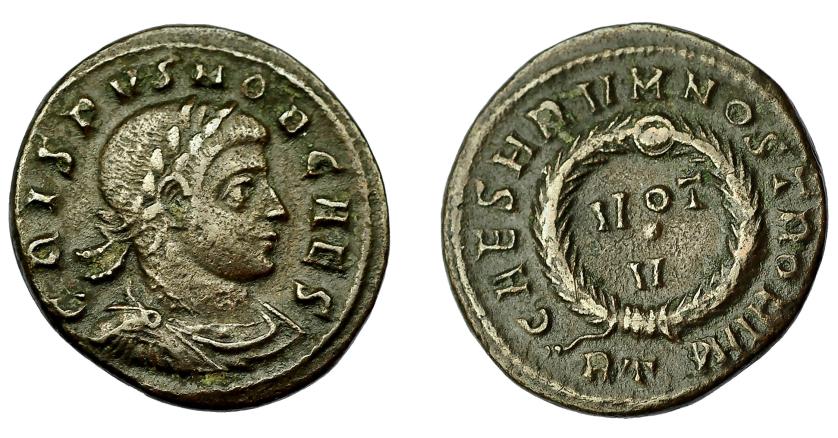 394   -  IMPERIO ROMANO. CRISPO. Follis. Roma (321). R/ Láurea rodeando VOT/V; CAESARVM NOSTRORVM, exergo RT. AE 3,25 g. 18 g. RIC-234. MBC.