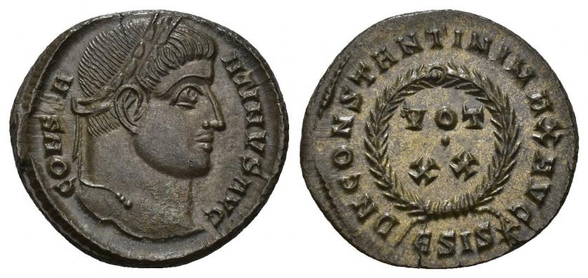 3295   -  IMPERIO ROMANO. CONSTANTINO I. Follis. Siscia (320). A/ Cabeza laureada a der.; CONSTA-NTINVS AVG. R/ Láurea rodeando VOT/XX, exergo ESIS*. AE 3,08 g. 19,43 mm. RIC-159. EBC+.