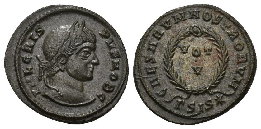 3296   -  IMPERIO ROMANO. CRISPO. Follis. Siscia (320-321). A/ Cabeza laureada a der.; IVL CRISPVS NOB C. R/ Láurea rodeando VOT/V; CAESARVM NOSTRORVM, exergo GSIS*. AE 3,48 g. 19,81 mm. RIC-161. EBC.