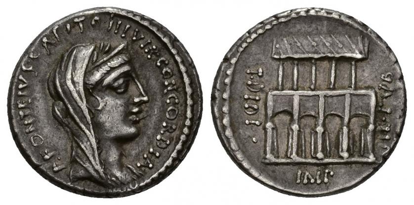 278   -  REPÚBLICA ROMANA. DIDIA. Titus Didius y P. Fonteius Capito. Denario. Roma (55 a.C.). A/ Cabeza de Concordia diademada y velada a der.; P FONTEIVS CAPITO III VIR CONCORDIA. R/ Vista de la villa pública con puertas entre las columnas y vertiente del tejado a der.; en campo T DIDI-VII-PVB-IMP. AR 4,07 g. 18,19 mm. CRAW-429.2b. FFC-678. MBC+. Muy escasa. Compra privada en la International New York Convention, 2005.