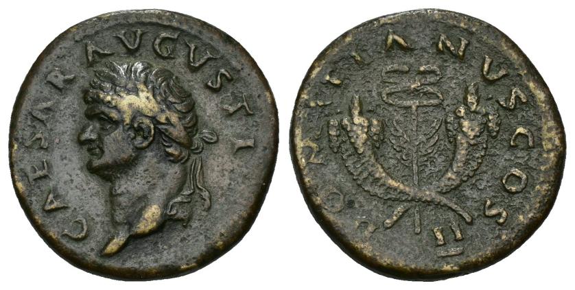 275   -  IMPERIO ROMANO. DOMICIANO (bajo Vespasiano). Dupondio. Roma (74 d.C.). A/ Cabeza laureada a der.; CAESAR AVGVSTI (F). R/ Caduceo alado con dos cornucopias cruzadas; DOMITIANVS COS II. AE 13,11 g. 26,6 mm. RIC-764. MBC.  Ex col. Cerdá, 1919. Conserva tejuelo antiguo.