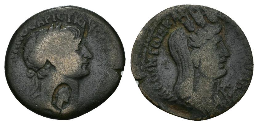 302   -  IMPERIO ROMANO. TRAJANO. AE. Laodicea ad Mare (114-115). A/ Cabeza laureada a der. R/ Busto de Tyche, delante fecha 162. AE 6,07 g. 24 mm. RPC-III, 3796. Contramarca cabeza femenina dentro de óvalo en anv. BC.