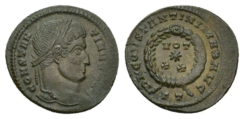 434   -  IMPERIO ROMANO. CONSTANTINO I. Follis. Ticinum (320). A/ Cabeza laureada a der.; CONSTANTINVS AVG. R/ Láurea rodeando VOT/*/XX; D N CONSTANTINI MAX AVG, exergo TT. AE 3,17 g. 20 mm. RIC-130. Vanos. EBC.