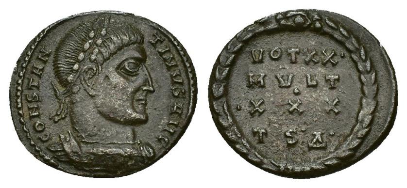 437   -  IMPERIO ROMANO. CONSTANTINO I. Follis reducido. Thessalonica (318-319). A/ Busto laureado y acorazado a der.; CONSTAN-TINVS AVG. R/ Láurea rodeando VOT/XX/MVLT, debajo TSD. AE 2,50 g. 13,5 mm. RIC-31. Pequeñas marcas. MBC+.