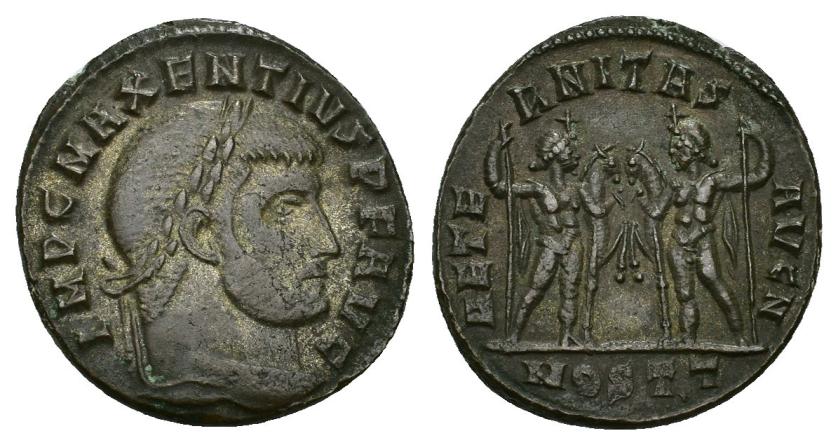 445   -  IMPERIO ROMANO. MAJENCIO. Follis. Ostia (309-312). A/ Cabeza laureada a der.; IMP C MAXENTIVS P F AVG. R/ Los Díóscuros; AETER-NITAS AVG N, exergo MOSTT. AE 6,41 g. 24,1 mm. RIC-35. MBC+.