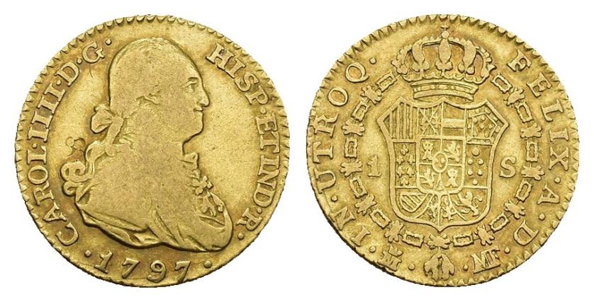 549   -  CARLOS IV. Escudo. 1797. Madrid. MF. AU 3,28 g. 17,6 mm. VI-911. Contramarca de cuatro círculos en anv. MBC-/MBC.