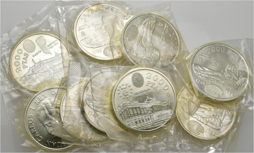 600   -  JUAN CARLOS I. Lote de 9 monedas de 2000 pesetas. De 1994 a 1996. AR. En envoltorio original. SC.