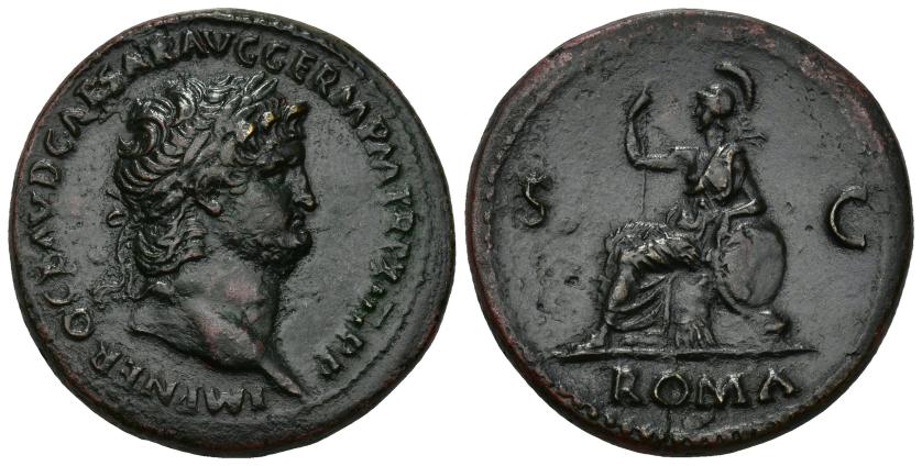 134   -  IMPERIO ROMANO. NERÓN. Sestercio. Roma (62-68 d.C.). A/ Cabeza laureada a der.; IMP NERO CLAVD CAESAR AVG GERM P M TR P XIII P P. R/ Roma sentada a izq. con lanza y escudo, detrás aramas,  en campo S-C, en exergo ROMA. AE 27,02 g. 34,9 mm. RIC-356. Campos ligeramente repasados. Pátina verde con tonos rojos. MBC+.