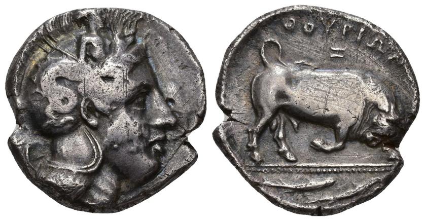 20   -  GRECIA ANTIGUA. LUCANIA. THORION. Distátera (s. IV a.C.). A/ Cabeza de Atenea a der. con casco decorado con Escila. R/ Toro embistiendo a der., encima QOURIWN y I, en exergo pez. AR 15,65 g. COP-1429. SBG-446 vte. Cospel abierto. Vanos y rayas. MBC-. Ex subasta Ibergold, Madrid (25-2-1988).