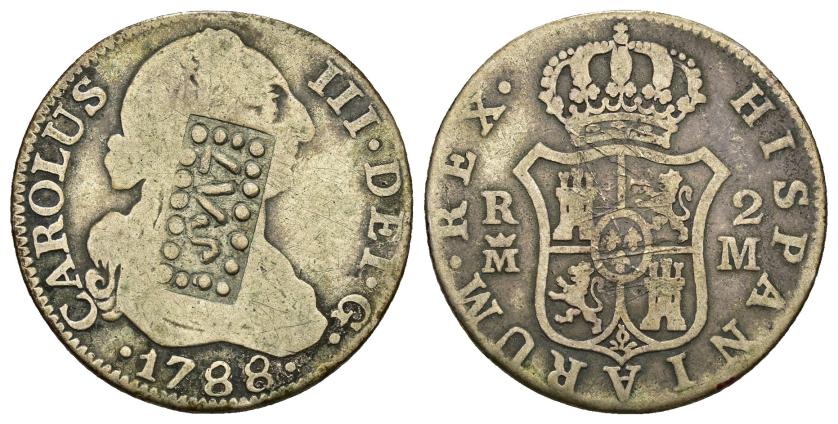 281   -  FERNANDO VII. Veracruz. Resello LVS (Labor Vincit Semper) dentro de rectángulo de puntos, sobre 2 reales 1788, Madrid M. AR 5,59 g. 25,2 mm. KM-no. El resello MBC.