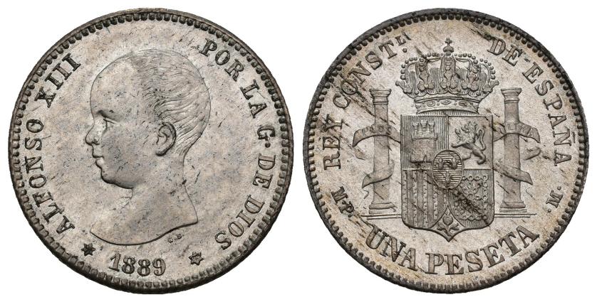 368   -  ALFONSO XIII. 1 peseta. 1889 *18-89. Madrid. MPM. AR 4,96 g. 22,9 mm. VII-150. Ligeras manchitas típicas de la peseta de esta fecha. B.O. SC. Rara en esta conservación.