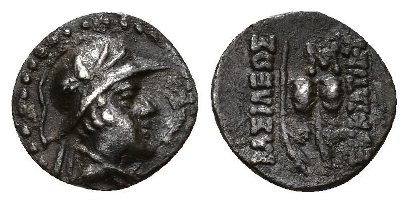 255   -  GRECIA ANTIGUA. BACTRIA. Eucrátides I. Óbolo (169-159 a.C.). A/ Busto con casco a der. R/ Dos palmas y dos píleos, en medio monograma; BASILEWS/EUKRATIDOU. AR 0,63 g. 10,6 mm. COP-275. SBG-7578. MBC. Muy escasa. Ex colección Guadán 2696.