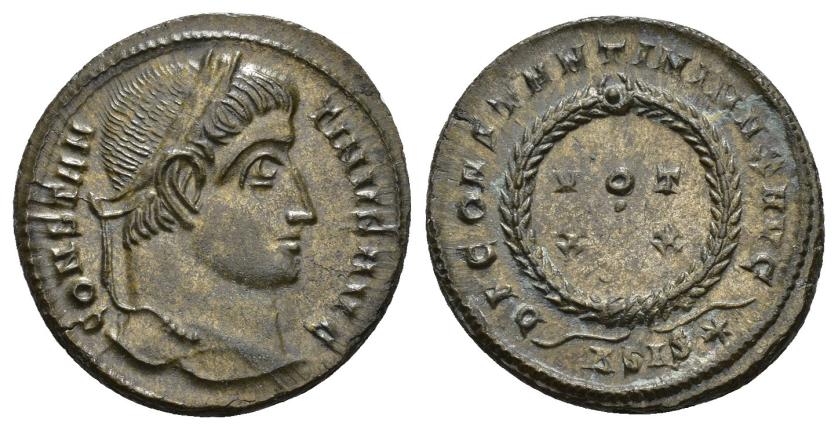 449   -  IMPERIO ROMANO. CONSTANTINO I. Follis. Siscia (320-321). A/ Cabeza laureada a der.; CONSTANTINVS AVG. R/ Láurea rodeando VOT/ XX exergo ASIS*; DN CONSTANTINI MAX AVG. AE 3,55 g. 20 mm. RIC-159. EBC.