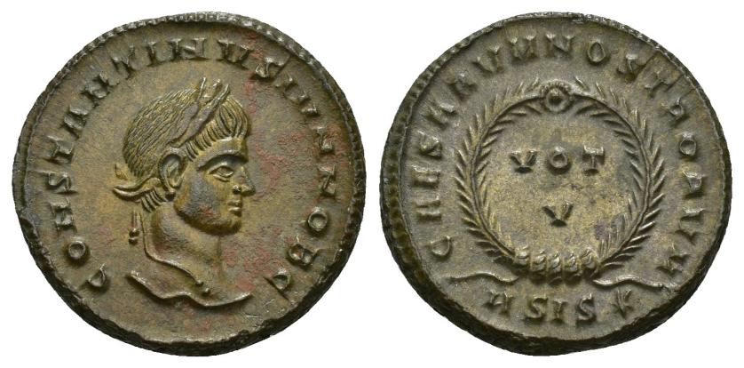 454   -  IMPERIO ROMANO. CONSTANTINO II. Follis. Siscia (320-321). A/ Cabeza laureada a der.; CONSTANTINVS IVN NOB C. R/ Láurea rodeando VOT/V; CAESARVM NOSTRORVM, exergo ASIS*. AE 3,74 g. 19 mm. RIC-163. EBC/EBC+. 