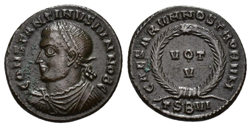 457   -  IMPERIO ROMANO. CONSTANTINO I. Follis. Tesalónica (320-321). A/ Busto diademado, drapeado y acorazado a izq.; CONSTANTINVS IVN NOB C. R/ Láurea rodeando VOT/V; CAESARVM NOSTRORVM, exergo TSBVI. AE 3,06 g. 18,3 mm. RIC-128. MBC/MBC+.