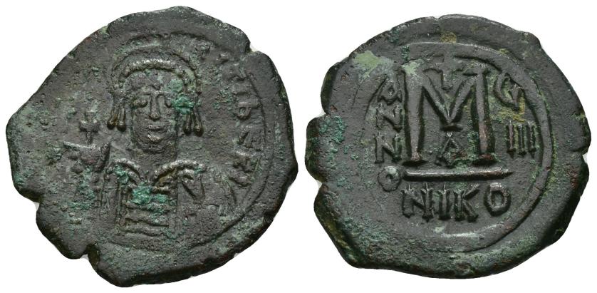 472   -  IMPERIO BIZANTINO. MAURICIO TIBERIO. Follis. Nicomedia. R/ Año 8, oficina A. AE 10,90 g. 32,9 mm. SBB-512. Leves oxidaciones. MBC/MBC+.