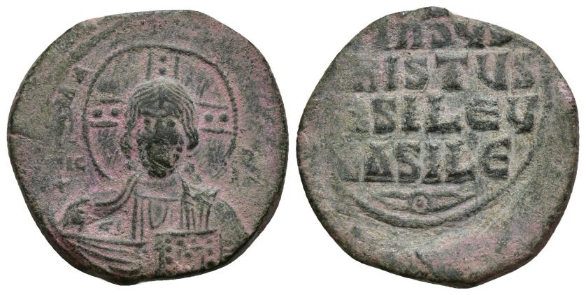 474   -  IMPERIO BIZANTINO. Follis. Anónimo. Siglo XI-XII. SBB-1818. AE 8,58 g. 26,9 mm. Rev. descentrado. Pátina verde. MBC-. 