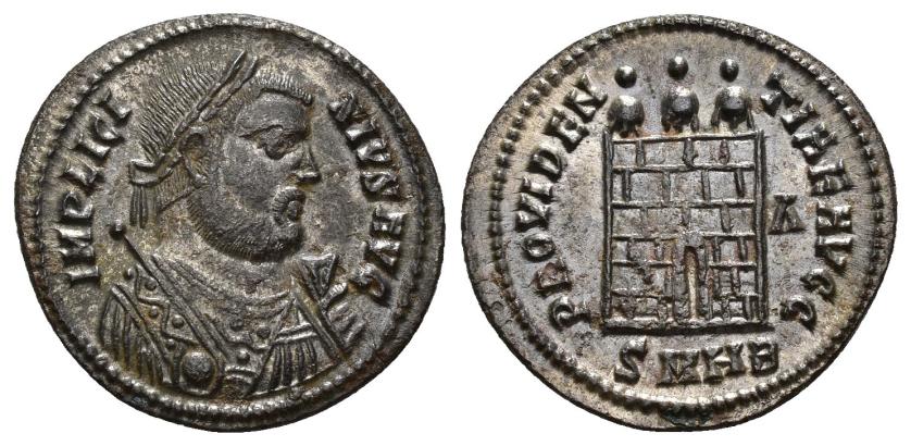 186   -  IMPERIO ROMANO. LICINIO. Follis. Heraclea (310). A/ Busto a der., laureado, drapeado, con globo, mappa y cetro; IMP LICINIVS AVG. R/ Puerta de campamento; PROVIDENTIAE AVGG. -/A//SMHB. AE 2,33 g. 20,1 mm. RIC-48. R.P.O. EBC.