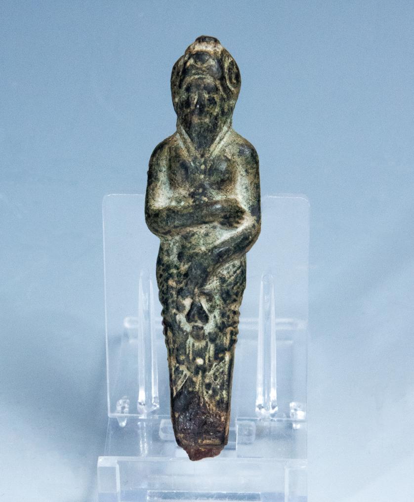 2049   -  ARQUEOLOGÍA. ROMA. Norte de África. Mango de cuchillo con figura antropomorfa (ss. IV-V d.C.). Bronce. Altura 8 cm.