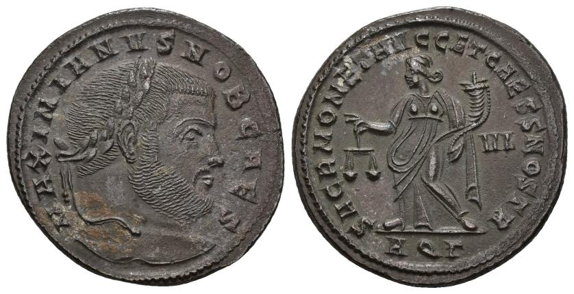 3123   -  IMPERIO ROMANO. GALERIO. Follis. Aquileia (302-303). A/ Cabeza laureada a der.; MAXIMIANVS NOB CAES. R/ Moneta a izq. con balanza y cornucopia; SACRA MONET AVGG ET CAESS NOTR. -/VI//AQG. AE 9,31 g. 27,5 mm. RIC-36b. Leves oxidaciones. EBC-/EBC.