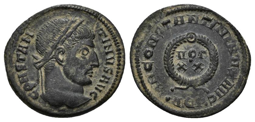 3156   -  IMPERIO ROMANO. CONSTANTINO. Follis. Aquileia (321). A/ Cabeza laureada a der.; CONSTANTINVS AVG. R/ Láurea rodeando VOT/XX; D N CONSTANTINI MAX AVG. -/-// . AQP .. AE 2,19 g. 19,3 mm. RIC-85. MBC+.