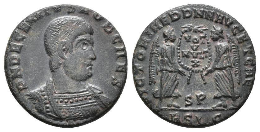 2433   -  IMPERIO ROMANO. DECENCIO. Follis. Lugdunum (351-353). A/ Busto acorazado a der.; D N DECENTIVS NOB CAES. R/ Dos Victorias sosteniendo escudo con VOT/MVLT/X; VICTORIAE DD NN AVG ET CAE. SP/RSLG. AE 3,81 g. 20,2 mm. RIC-137. MBC+.