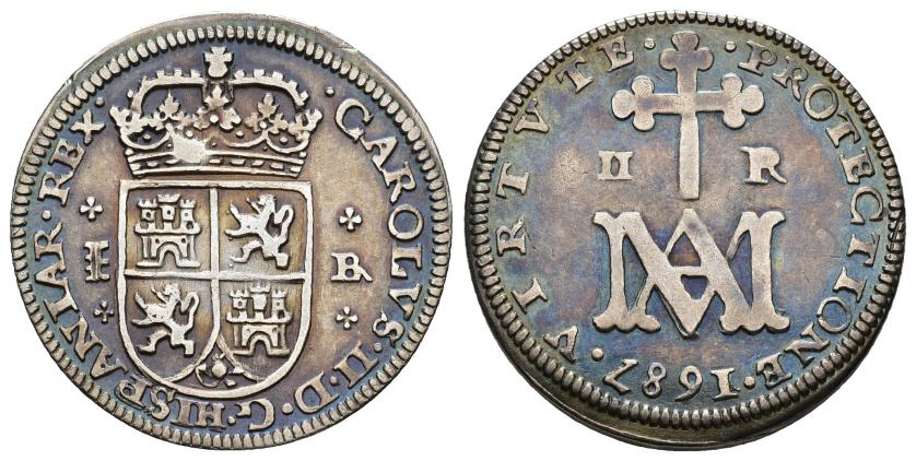 2501   -  CARLOS II. 2 reales. 1687. Segovia. BR. AR 5,13 g. 28,2 mm. AC-449. MBC/MBC-. Muy escasa.