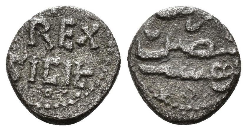 1269   -  NORMANDOS DE SICILIA. ENRIQUE VI (1194-1197). Fracción de dírham. (Palermo). 1194-95 H. REX / SICIL. AR 0,69 g. 9 mm. MEC 14.III-477. Porosidades. MBC.