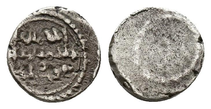 651   -  ALMORÁVIDES. ALI B. YUSUF CON HEREDERO TASUFIN (533-537/1139-1143). 1/2 quirate. Sin ceca. Sin fecha. AR 0,39 g. 7,5 mm. V-1815; B-Cg1. MBC-.