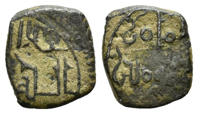688   -  TAIFAS ALMORÁVIDES. YAHYÀ B. ALI B. GANIYYA  (511-514/1146-1149). Fragmento de dírham. Sin ceca. Sin fecha. CU 0,97 g. 11 mm. FrHand-374. MBC.