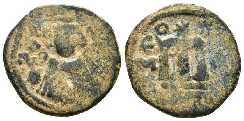 995   -  CALIFATO OMEYA. MARWAN II AL-HIMAR(127-133/744-750). Felús. Emesa. Sin fecha. A/ Emperador de pie; a izq. ΚΑΛΟΝ, a der.  بحمص. CU 3,7 g. 20 mm. Walker I-59; SICA 1-543. BC.